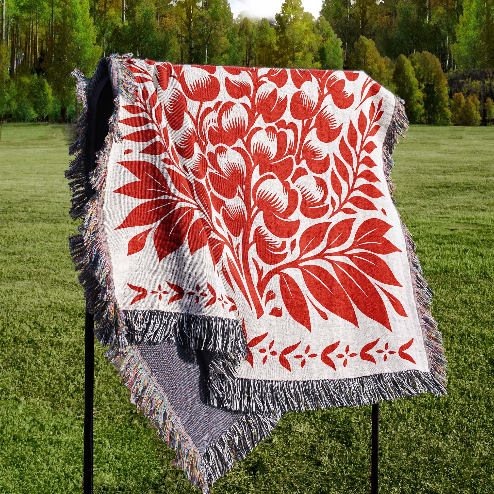 floral woven blanket draped over a stand