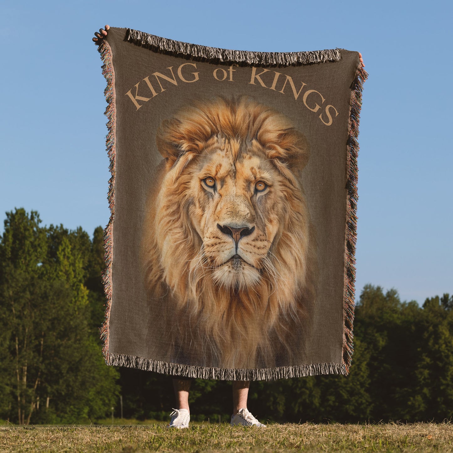 Woven blanket with lion graphic