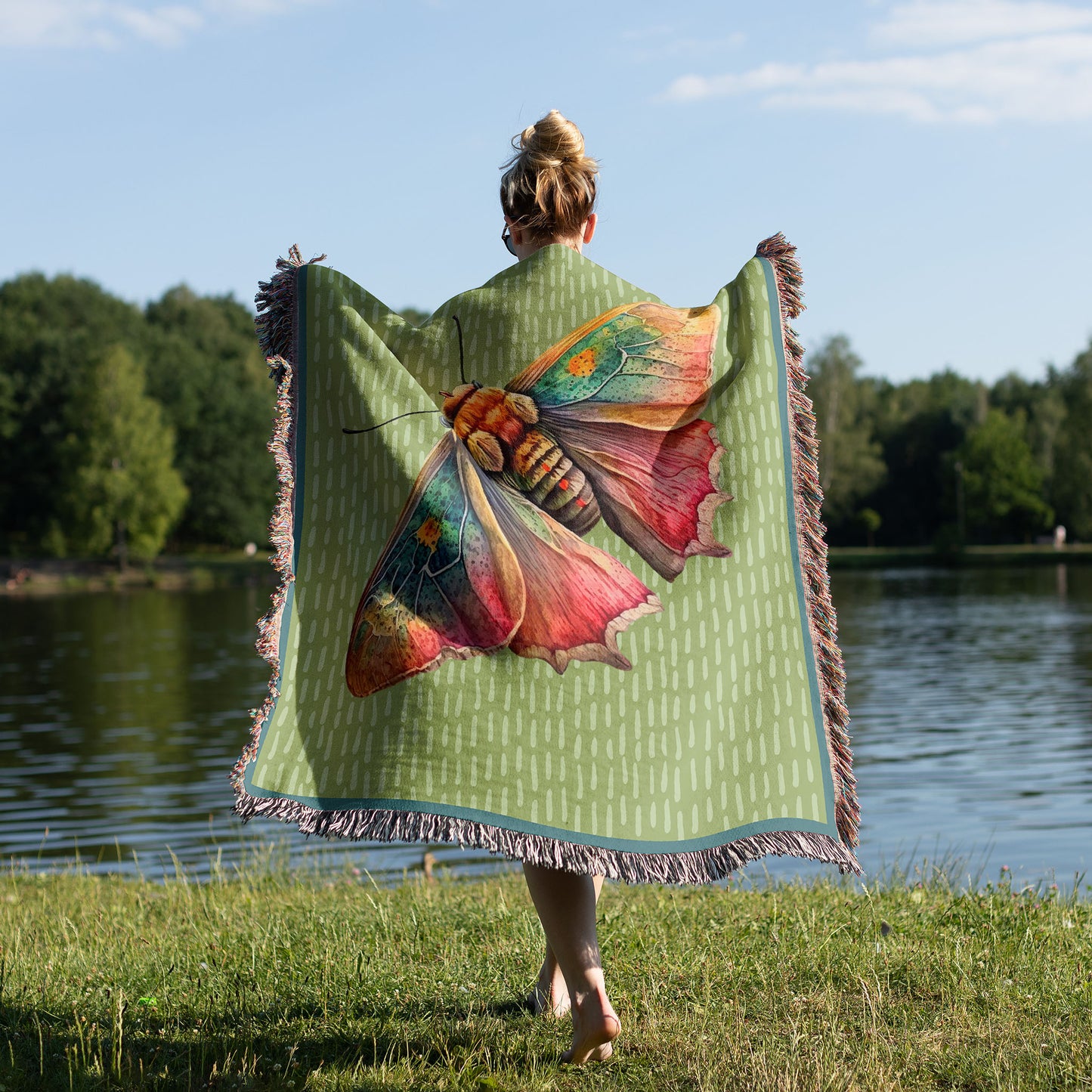 Woman with a woven blanket draped over her shoulders