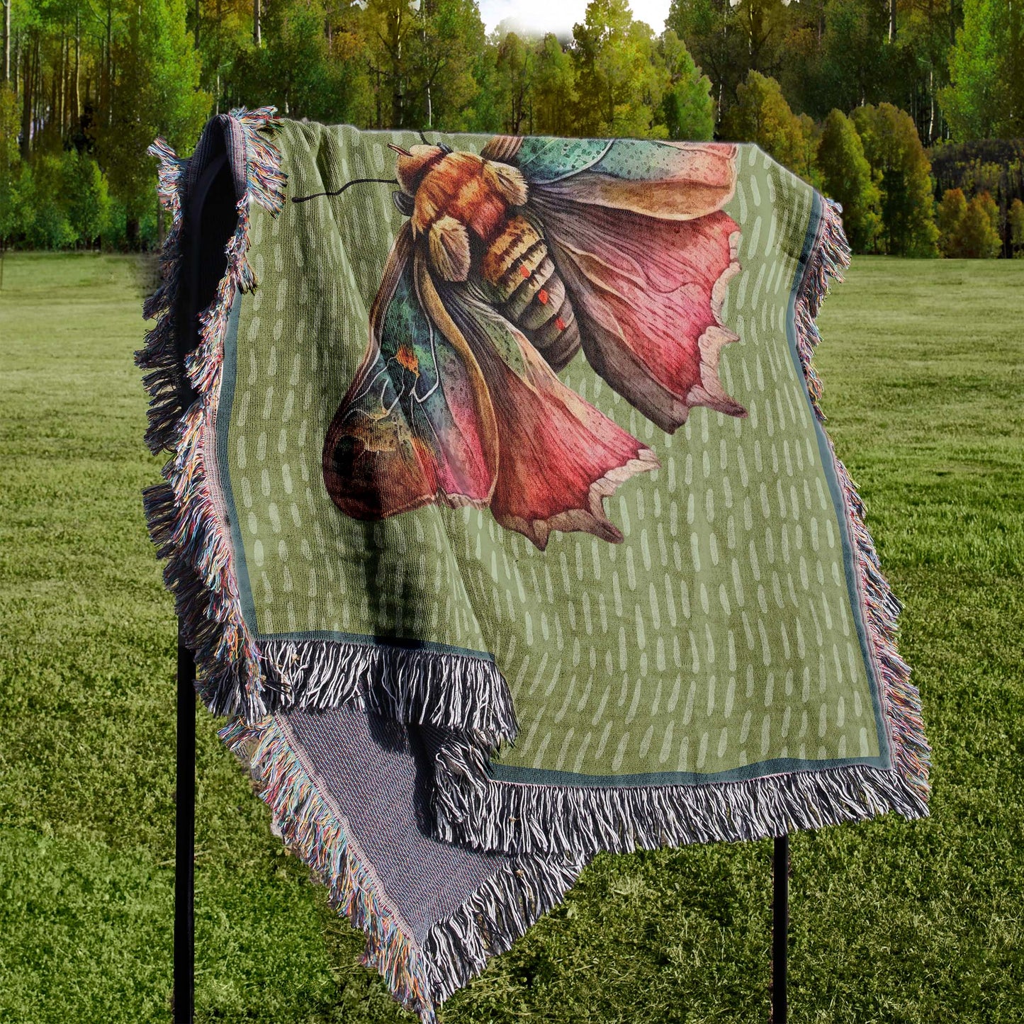 woven blanket draped over a stand