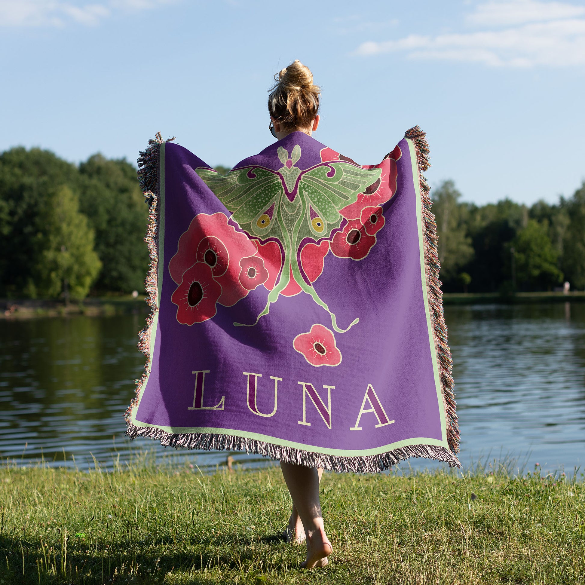 Woman with a woven blanket over her shoulders