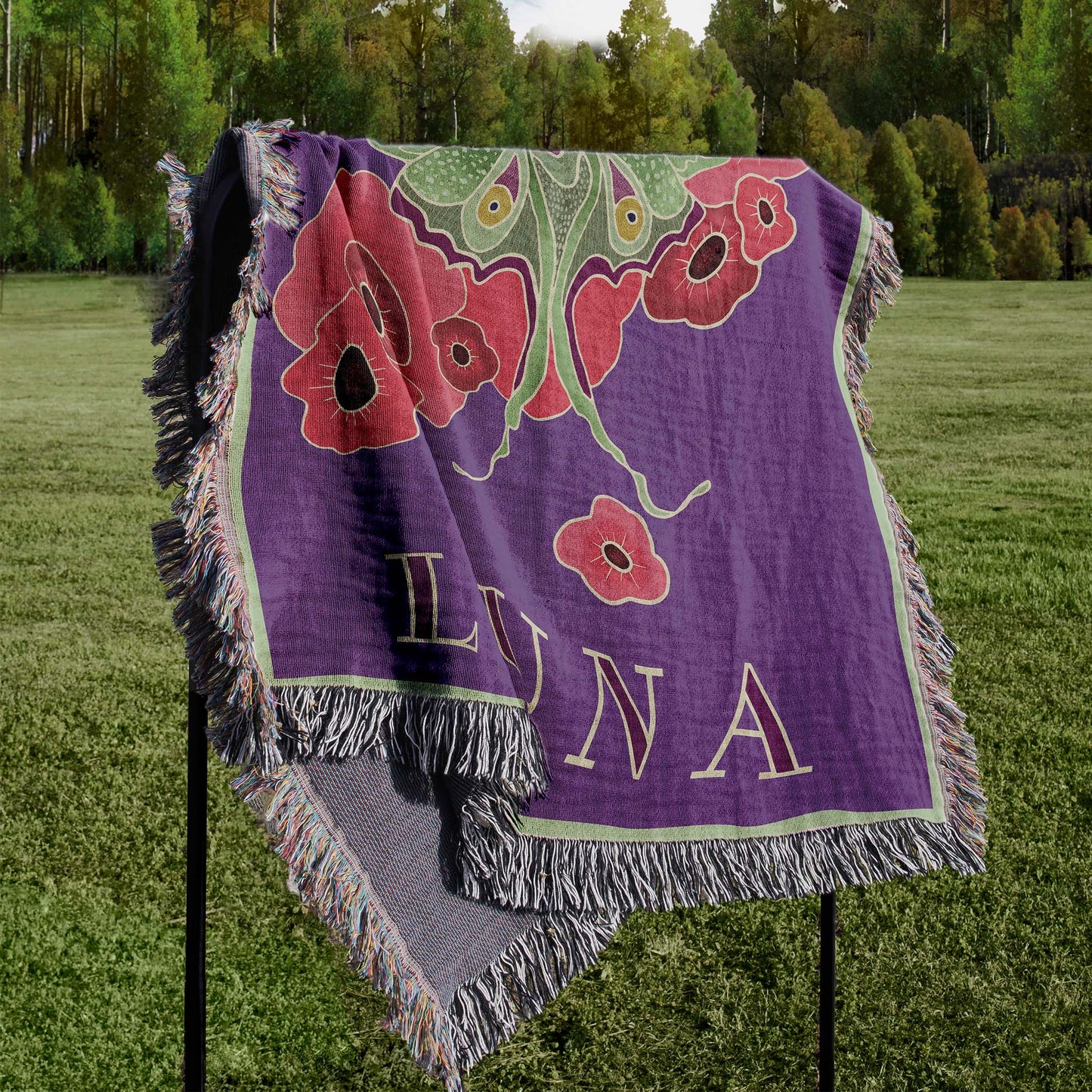 woven blanket draped over a stand